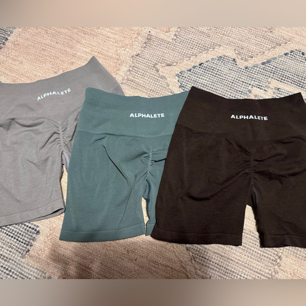 Three pairs of alphalete shorts size small